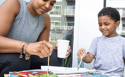 Pre-K mom and child painting together